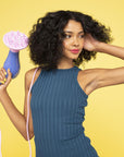 Woman holding up a Pro Dryer Diffuser